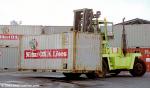 ID 1857 PORT OF AUCKLAND, NZ -  A mast-lift truck with container, Axis Fergusson Container Terminal.